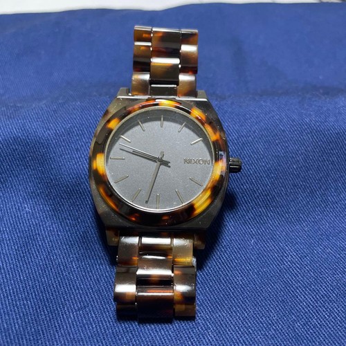 Nixon watch with - with, tortoiseshell