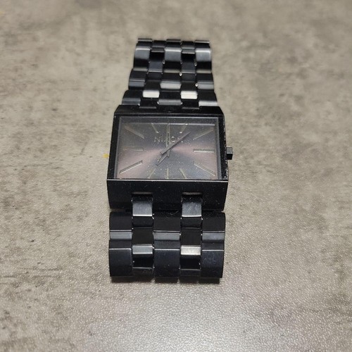Nixon black square face watch - face,