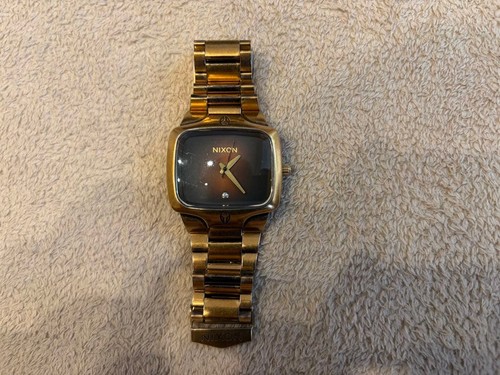 Nixon the player gold - the, black